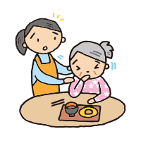 食卓でむせる高齢女性