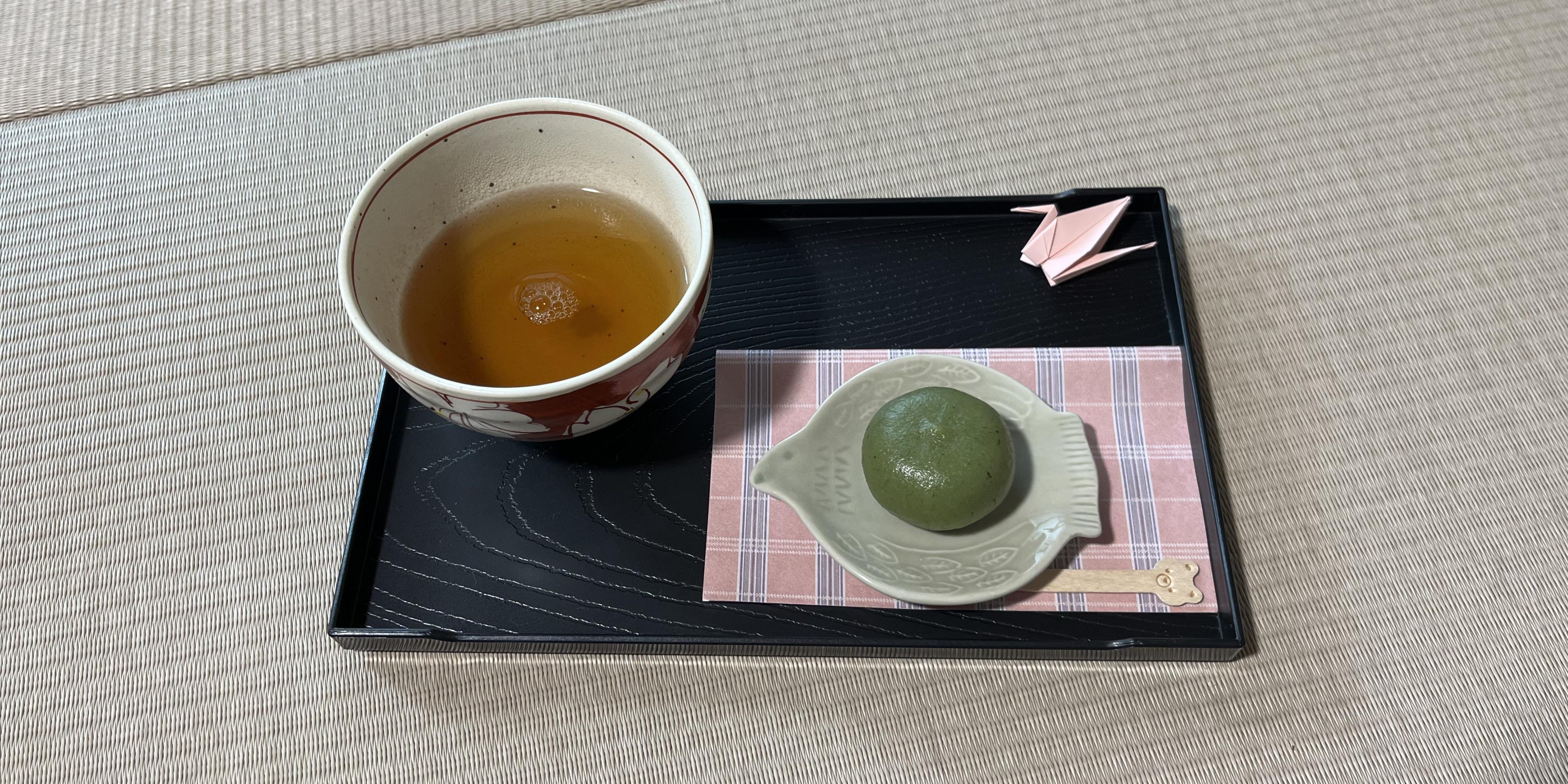 Japanese tea and wagashi served after a relaxing Usui Reiki session as part of the healing experience.