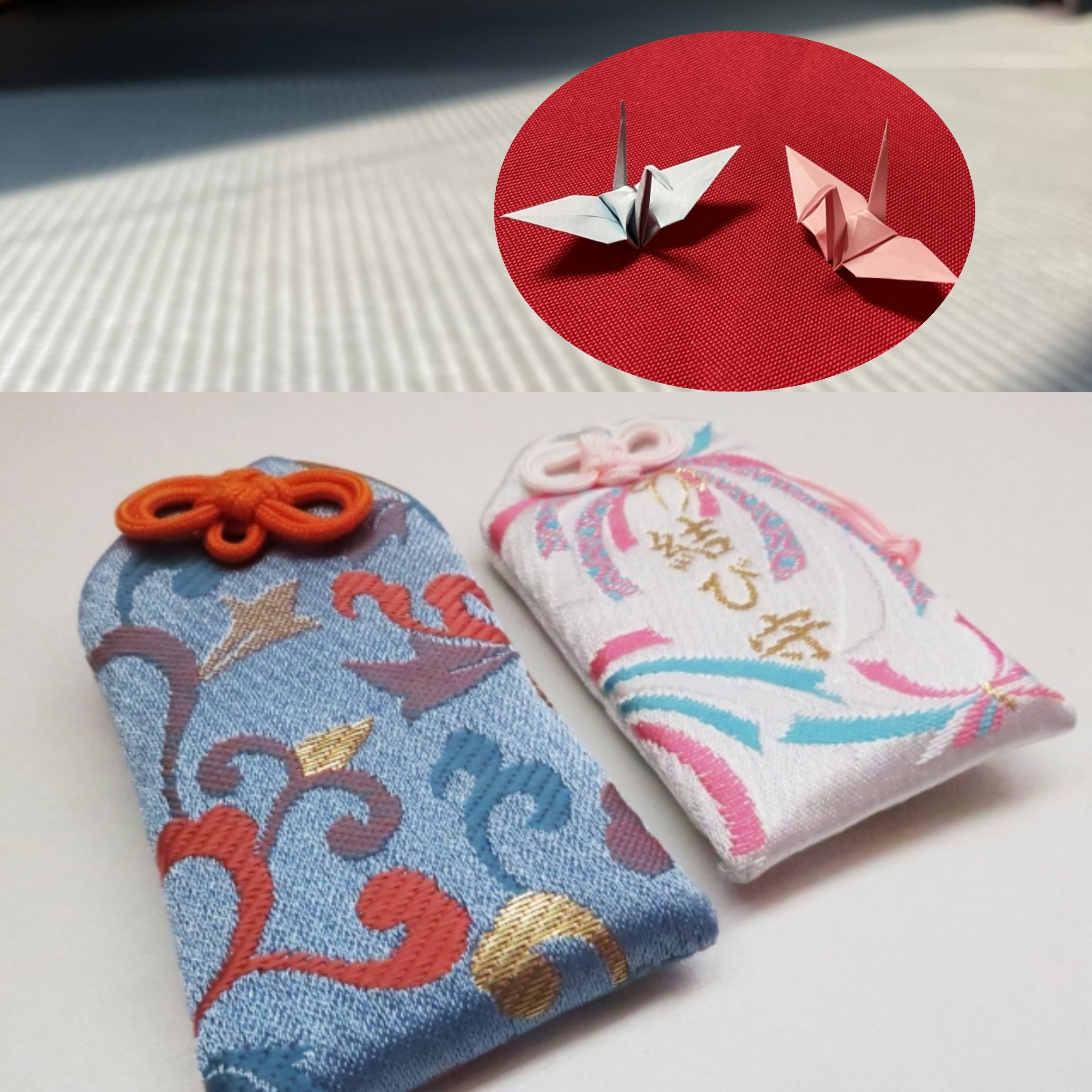 Handcrafted origami cranes and beautiful Japanese Omamori amulet pouches provided as special keepsakes for guests.