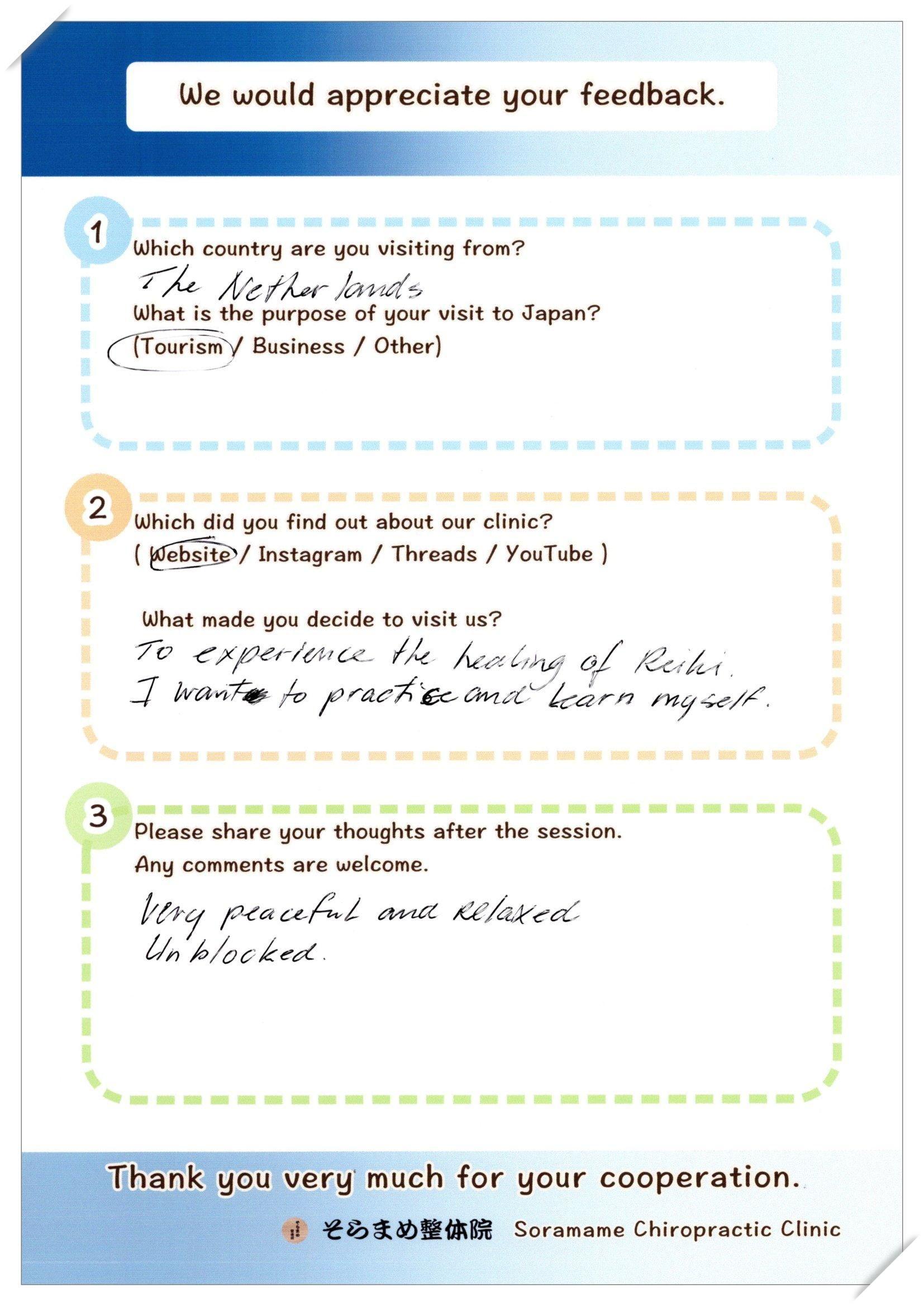 Handwritten feedback form from a guest from the Netherlands, noting a peaceful, relaxed, and unblocked feeling after the Reiki session.