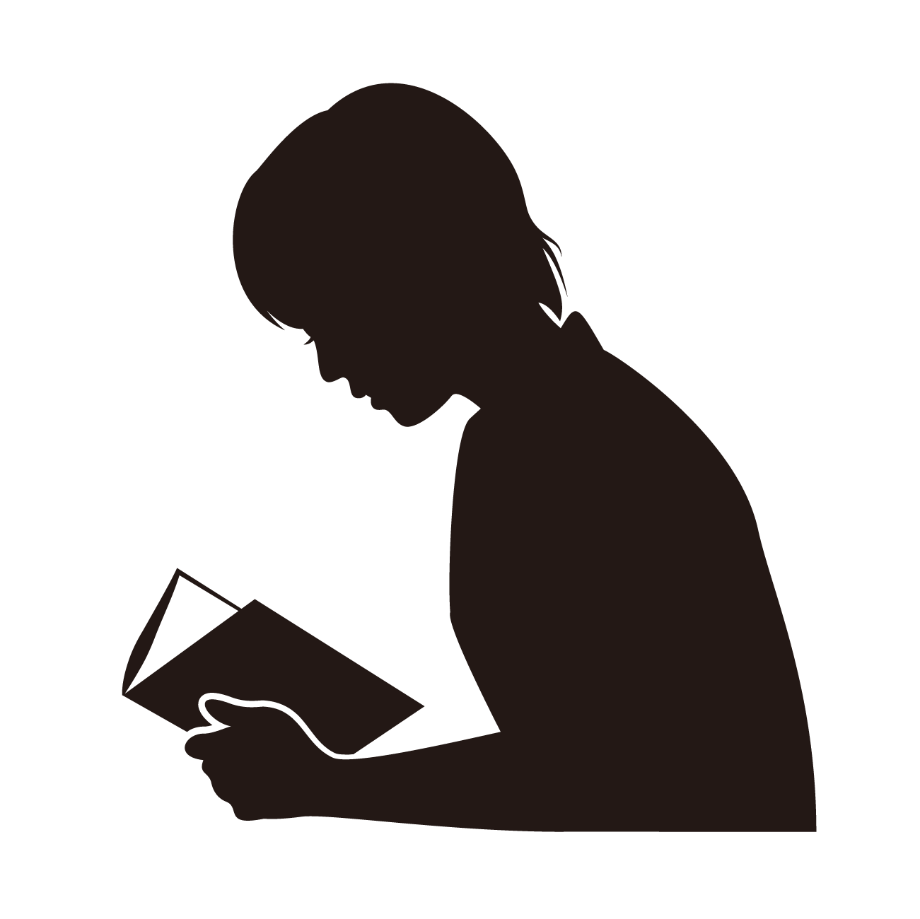 読書をする子どものシルエット