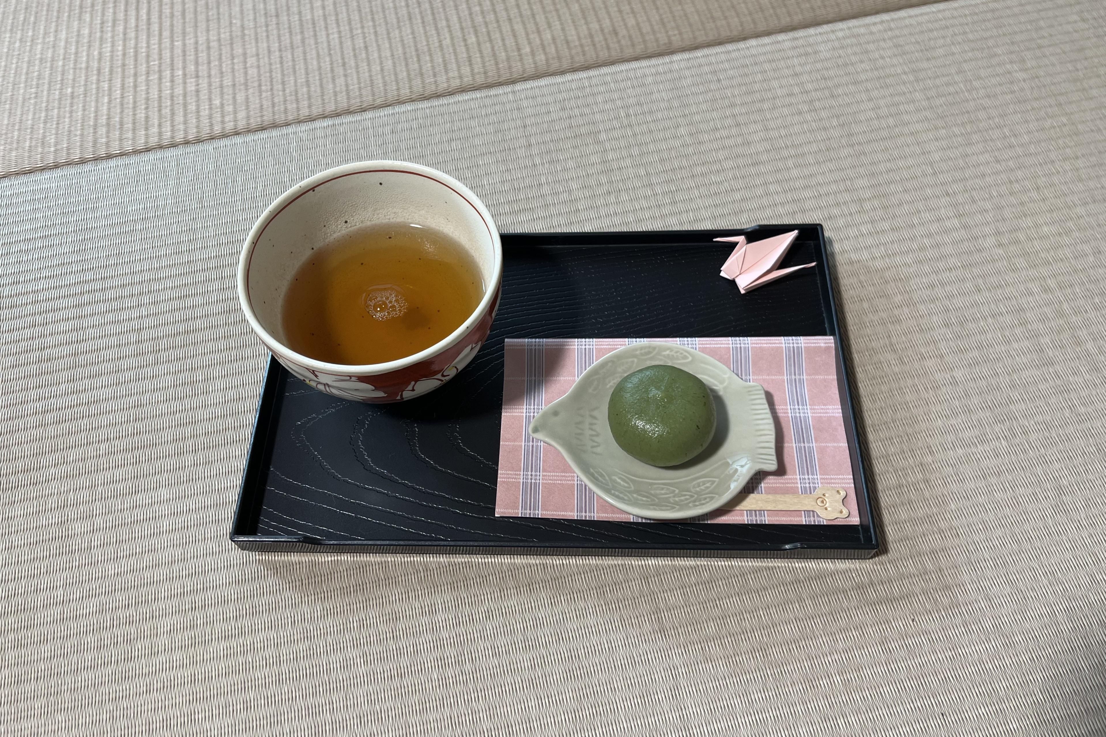 Japanese tea and seasonal wagashi sweets served after a Reiki session in a tatami room