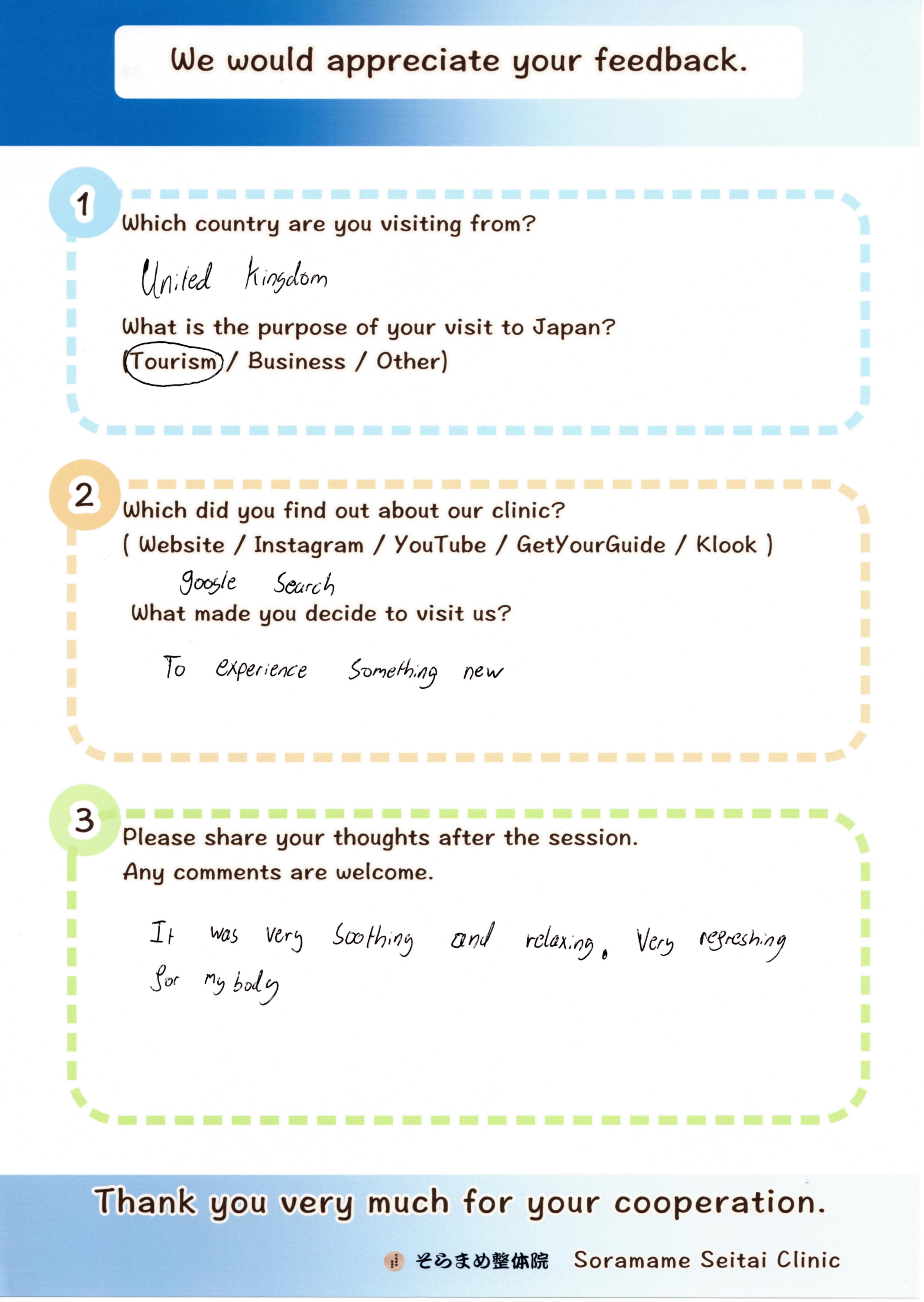 Handwritten feedback form from an English guest, describing the refreshing Reiki experience for his body.