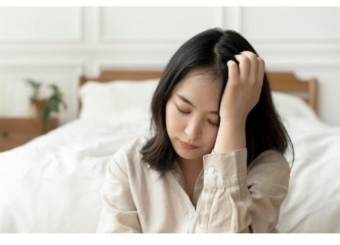 疲れている40代女性